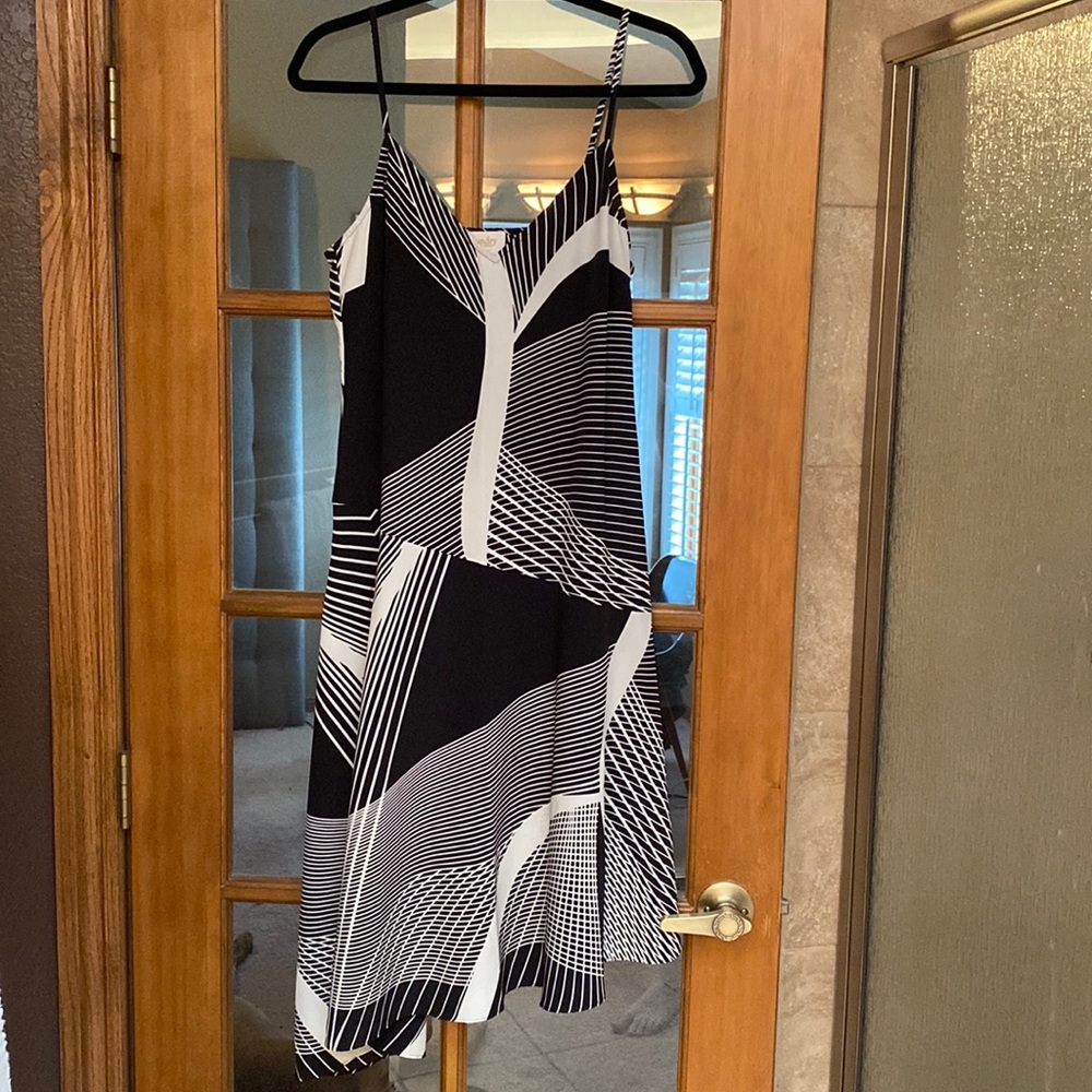 Asymmetrical black and white spaghetti strap dress